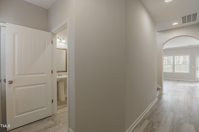 hall featuring light hardwood / wood-style floors