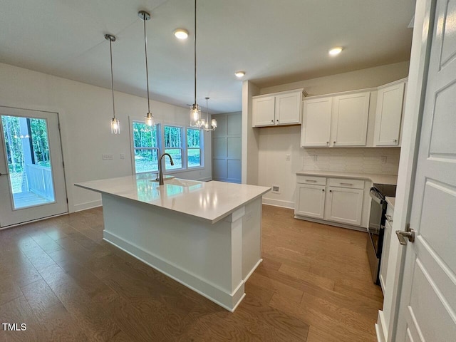 262 Grand Griffon Way, Lillington, NC 27546 - kitchen with light countertops, dark wood-style flooring, white cabinetry, and recessed lighting