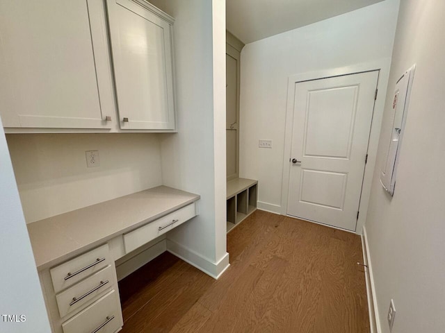 262 Grand Griffon Way, Lillington, NC 27546 - unfurnished office with dark wood finished floors and built in study area