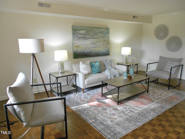 living room with crown molding and dark parquet floors