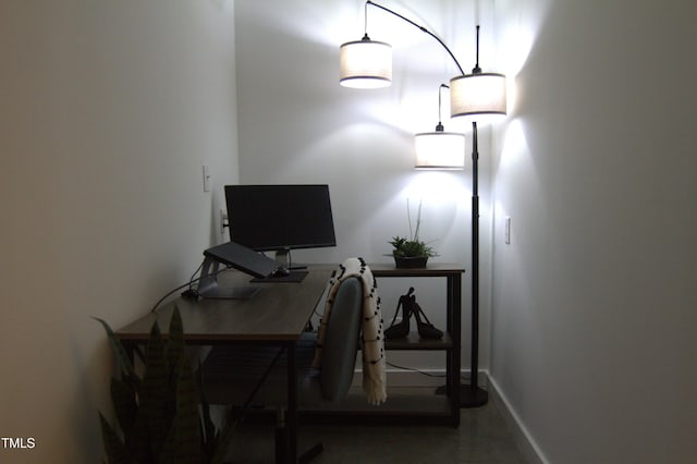 office space featuring baseboards