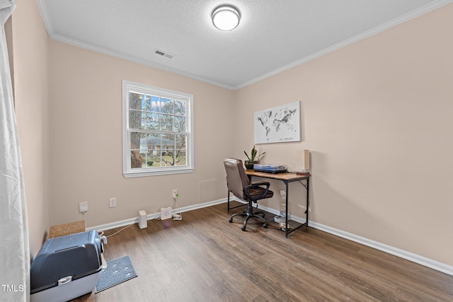 home office with wood-type flooring, a textured ceiling, and crown molding