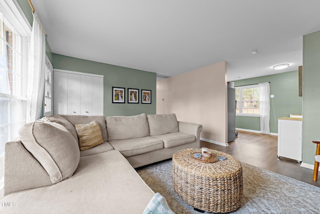 living room with dark wood-type flooring