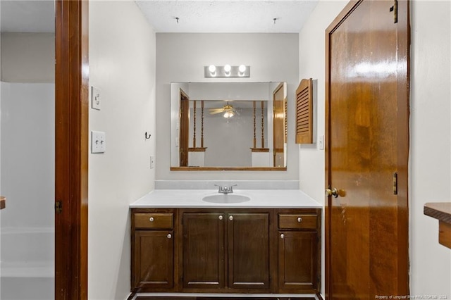 bathroom featuring vanity and ceiling fan