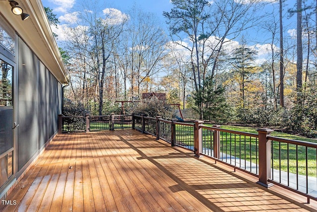 wooden deck with a yard