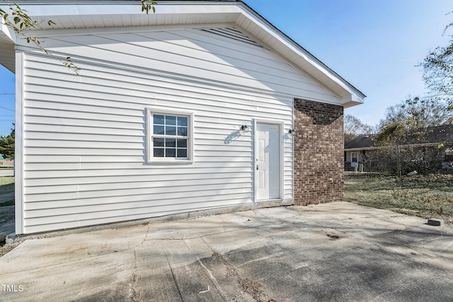 rear view of property with a patio