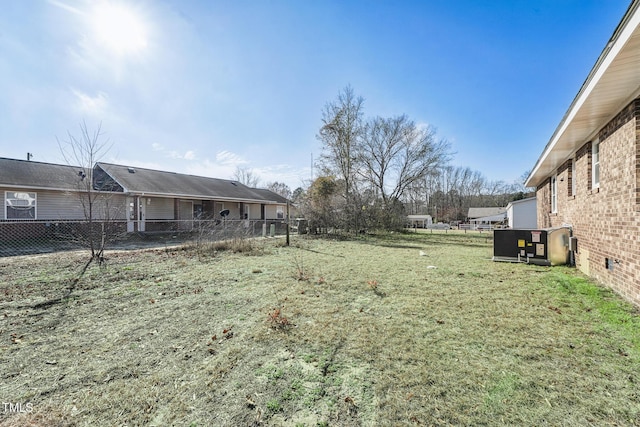 view of yard with central AC