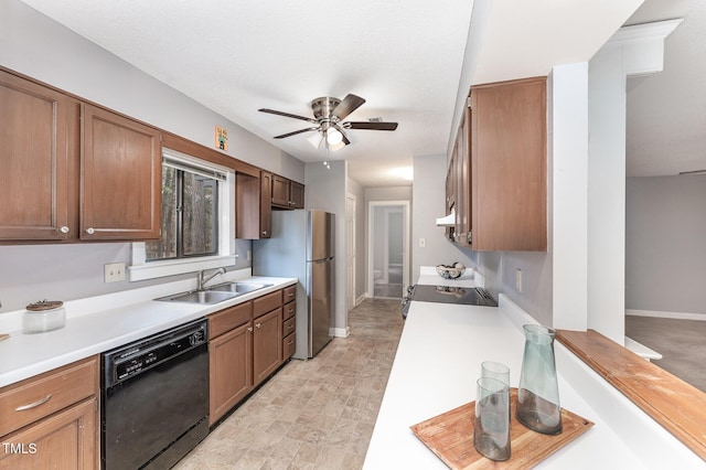 kitchen with stainless steel refrigerator, dishwasher, sink, stove, and ceiling fan