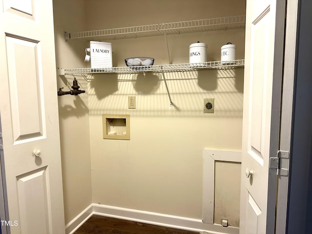 clothes washing area featuring dark hardwood / wood-style flooring, hookup for a washing machine, and hookup for an electric dryer