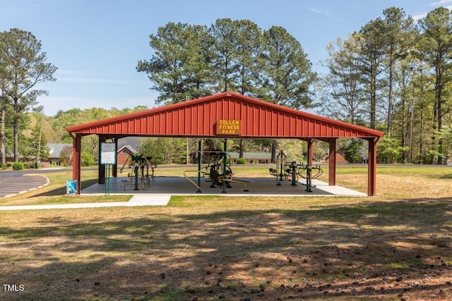 surrounding community featuring a yard and a playground