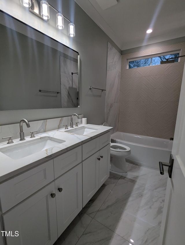 full bathroom with tiled shower / bath combo, toilet, and vanity