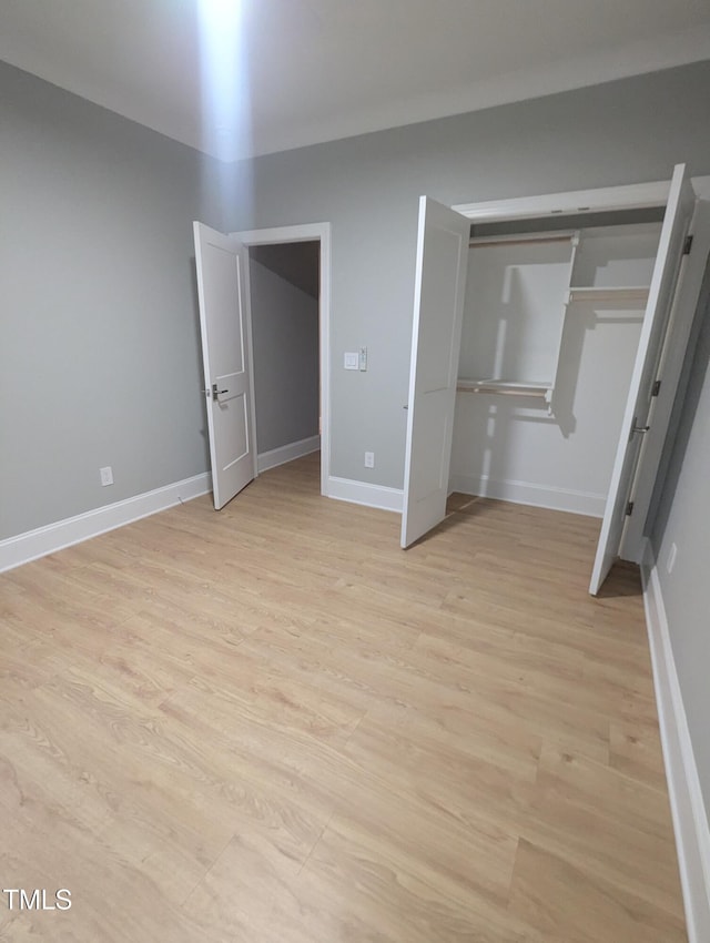 unfurnished bedroom featuring light hardwood / wood-style flooring