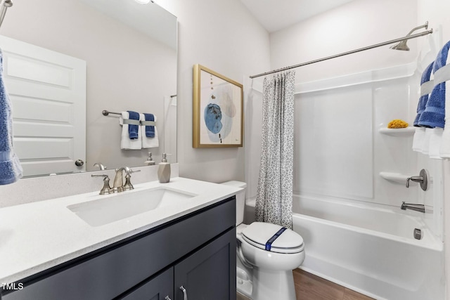 full bathroom with wood-type flooring, vanity, toilet, and shower / bathtub combination with curtain