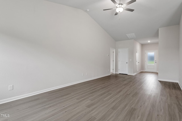 unfurnished living room with ceiling fan, dark hardwood / wood-style flooring, and lofted ceiling