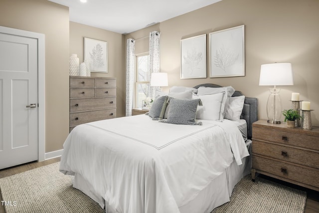 bedroom with light hardwood / wood-style floors