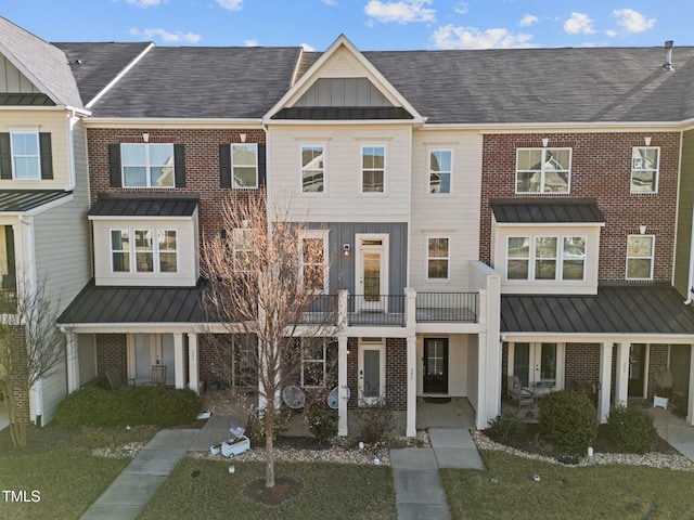 view of property featuring a balcony