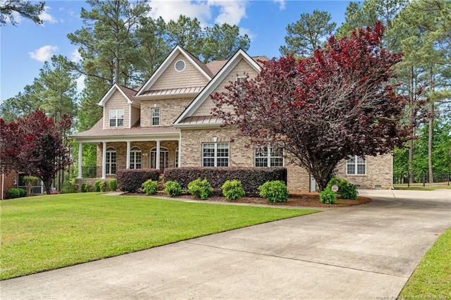 view of front of home with a front lawn