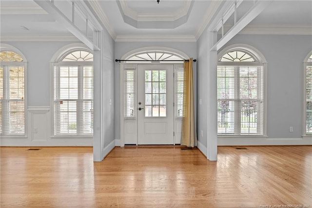 interior space featuring light hardwood / wood-style flooring and ornamental molding