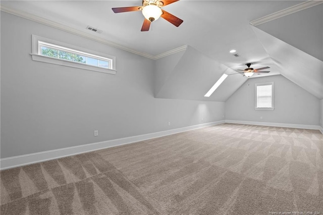 additional living space featuring ceiling fan, carpet floors, and vaulted ceiling