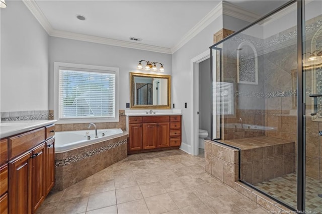 full bathroom with vanity, tile patterned floors, toilet, ornamental molding, and shower with separate bathtub