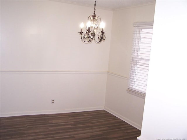 583 Winding Creek Rd Unit H, Fayetteville, NC 28305 - empty room featuring dark hardwood / wood-style floors, crown molding, and a chandelier
