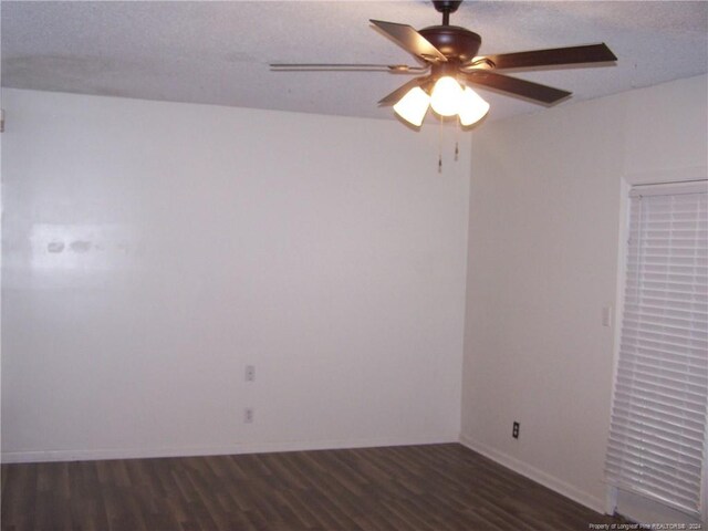 583 Winding Creek Rd Unit H, Fayetteville, NC 28305 - spare room featuring ceiling fan, dark wood-type flooring, and a textured ceiling