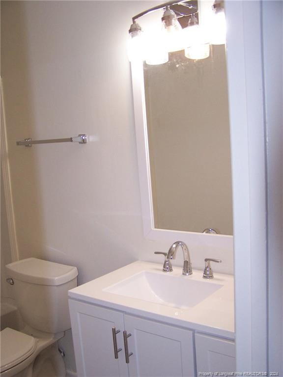 583 Winding Creek Rd Unit H, Fayetteville, NC 28305 - bathroom featuring vanity and toilet
