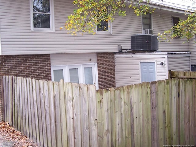 583 Winding Creek Rd Unit H, Fayetteville, NC 28305 - view of property exterior featuring central AC unit