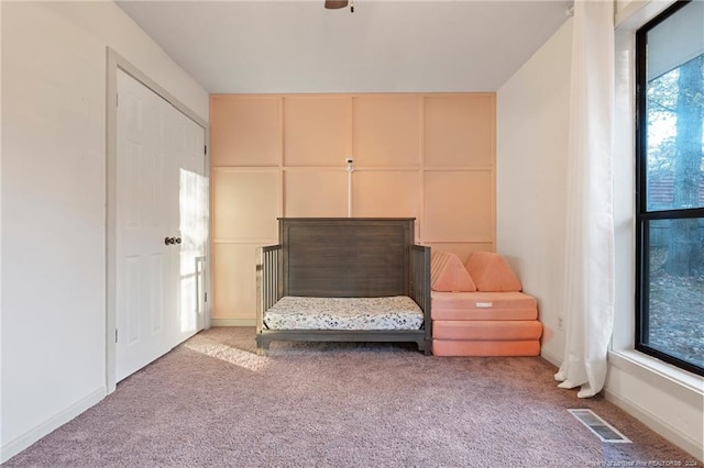 unfurnished room featuring carpet