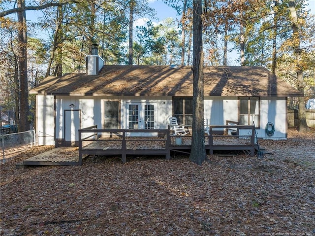 back of property with french doors and a deck