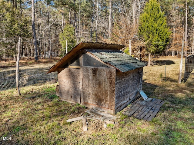 view of outdoor structure with a lawn