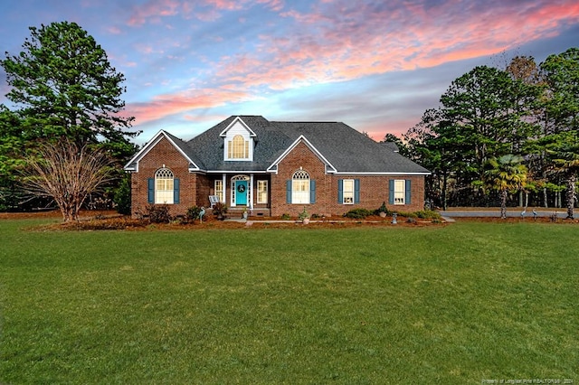 view of front facade with a lawn