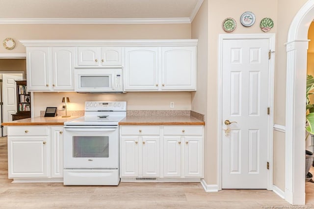 kitchen with light hardwood / wood-style flooring, white cabinets, white appliances, and ornamental molding