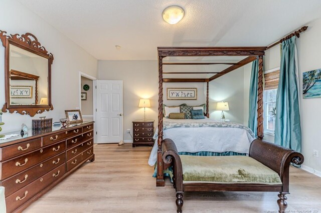 bedroom featuring light hardwood / wood-style flooring