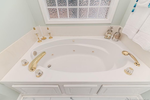 bathroom with a washtub