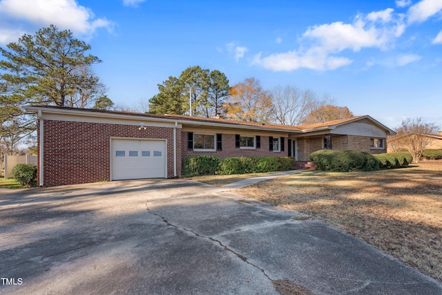 ranch-style home with a garage