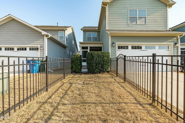 view of front of property with a garage