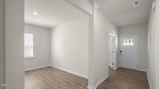 foyer with light wood-type flooring