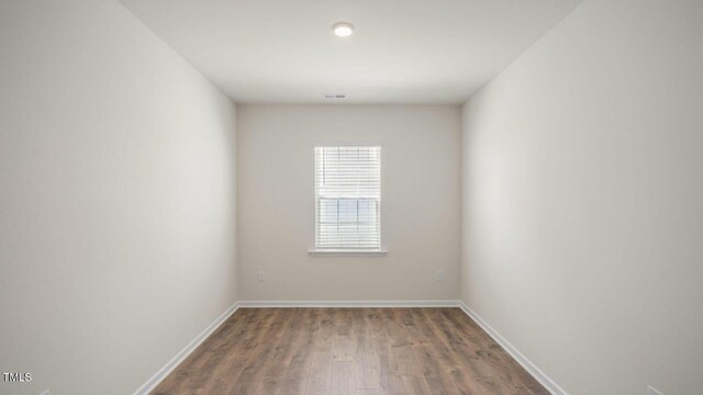 273 Hanging Elm Ln, Fuquay Varina, NC 27526 - unfurnished room featuring wood finished floors