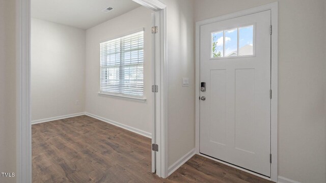 273 Hanging Elm Ln, Fuquay Varina, NC 27526 - foyer with dark wood-style floors and baseboards