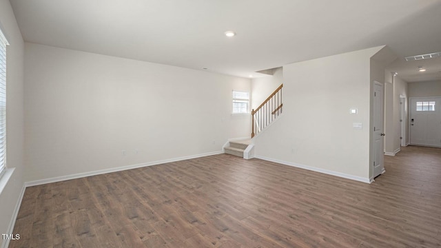 273 Hanging Elm Ln, Fuquay Varina, NC 27526 - unfurnished room featuring stairway, wood finished floors, and recessed lighting