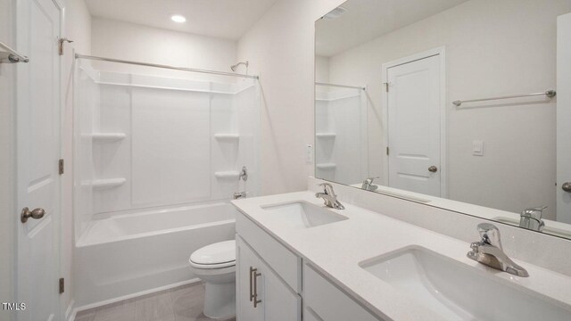 273 Hanging Elm Ln, Fuquay Varina, NC 27526 - bathroom featuring double vanity, shower / washtub combination, and recessed lighting