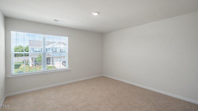 273 Hanging Elm Ln, Fuquay Varina, NC 27526 - unfurnished room featuring carpet floors