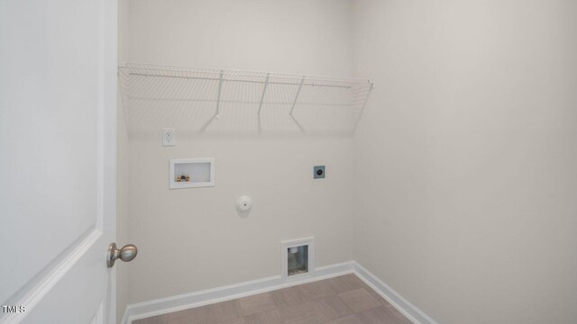 laundry area with gas dryer hookup, washer hookup, and hookup for an electric dryer