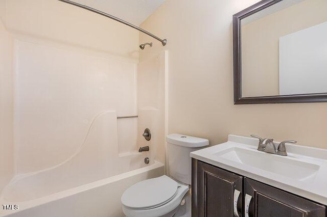 full bathroom with vanity, shower / bath combination, and toilet