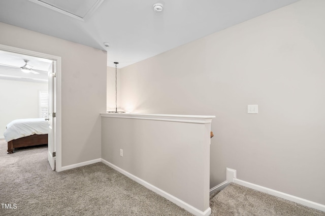 hallway featuring carpet flooring