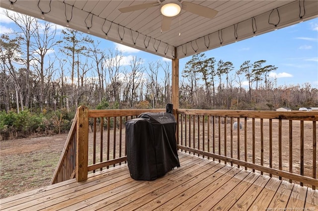 deck with ceiling fan and grilling area