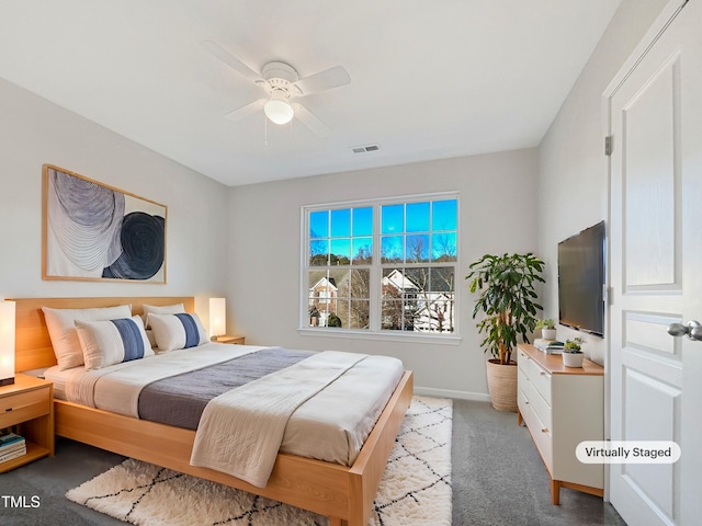 carpeted bedroom featuring ceiling fan