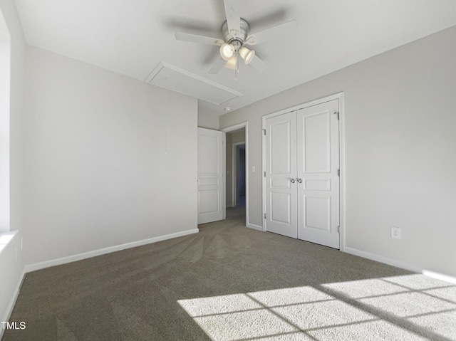 unfurnished bedroom featuring carpet flooring, ceiling fan, and a closet