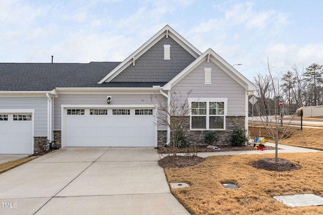 craftsman-style house with a garage